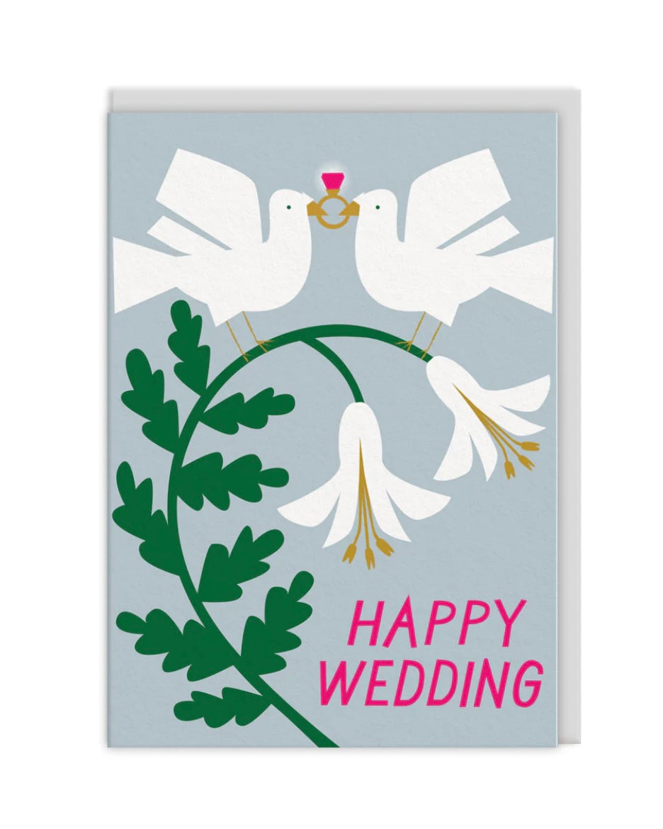 Card with two white doves holding a ring, surrounded by flowers and leaves, on a light blue background with 'Happy Wedding' text.