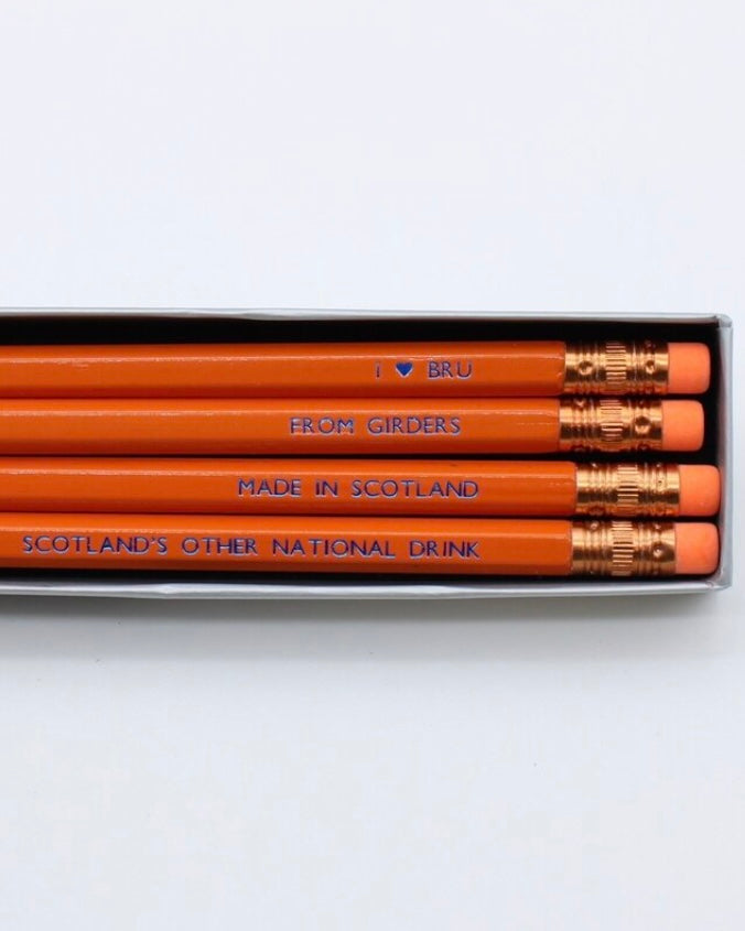 Box of pencils with text relating to the drink Irn Bru on a white background