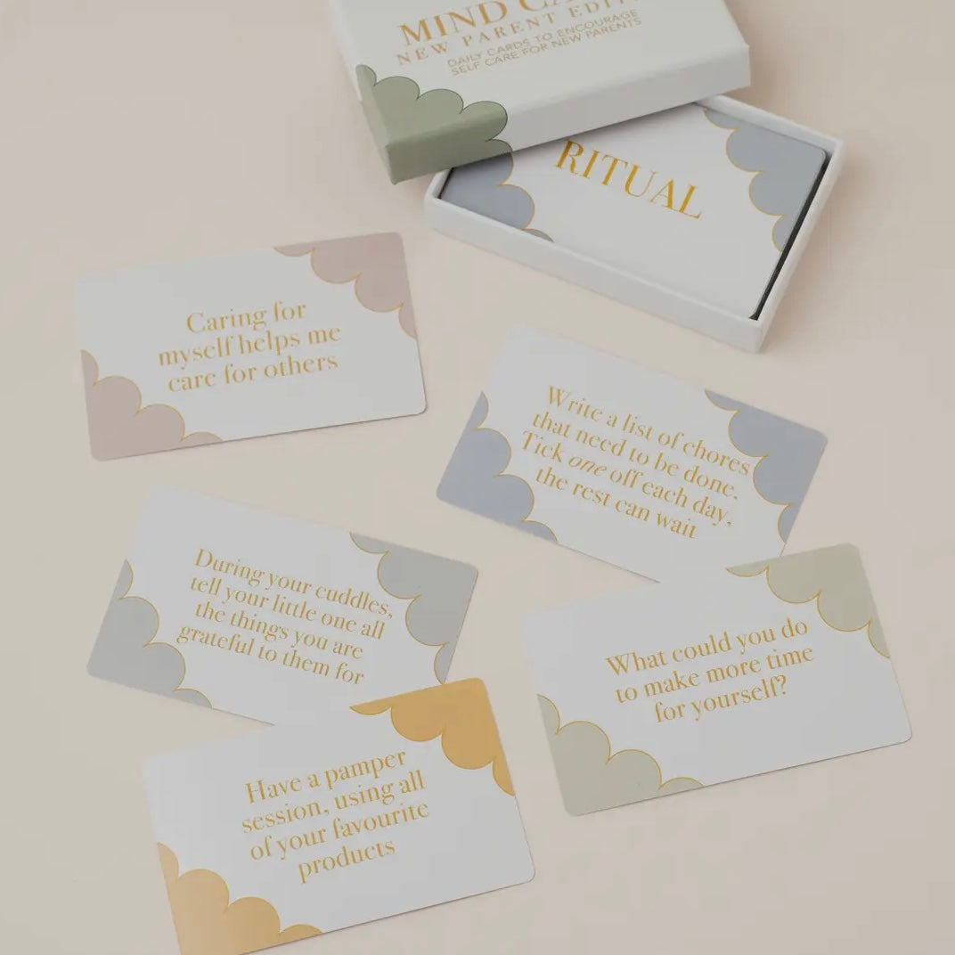 Set of cards with motivational phrases for new parents on a light background