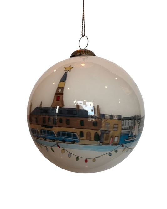 Handpainted glass Christmas bauble with a Stonehaven skyline on a white background, featuring iconic Stonehaven town buildings, along with decorative holiday lights.