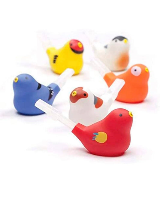 Colourful bird-shaped bath whistles on a white background