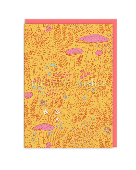 Card with a colorful mushroom and nature pattern on a yellow background and the text ‘Birthday Wishes’, with a pink envelope.