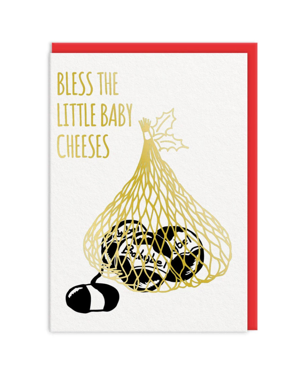 Christmas card with a net of babybel cheeses and text 'Bless the little baby cheeses' on a white background, with a red envelope.