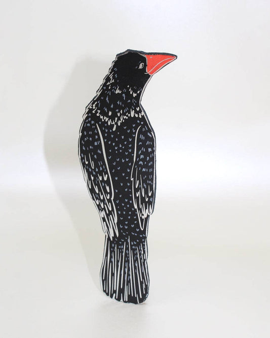 Decorative bird-shaped bookmark with black and white pattern on a white background