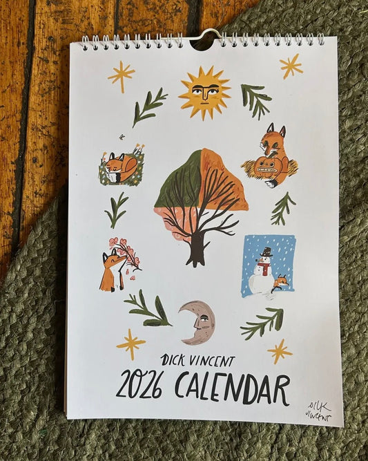 2026 calendar with nature-themed illustrations on a textured surface