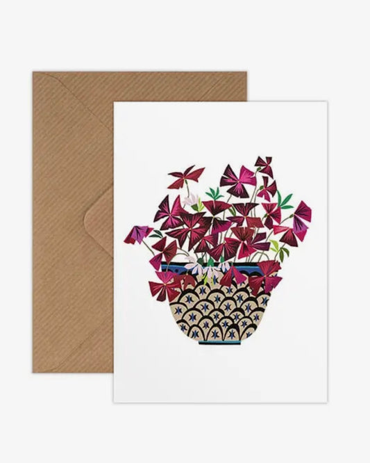 Card with floral design and matching envelope on a white background