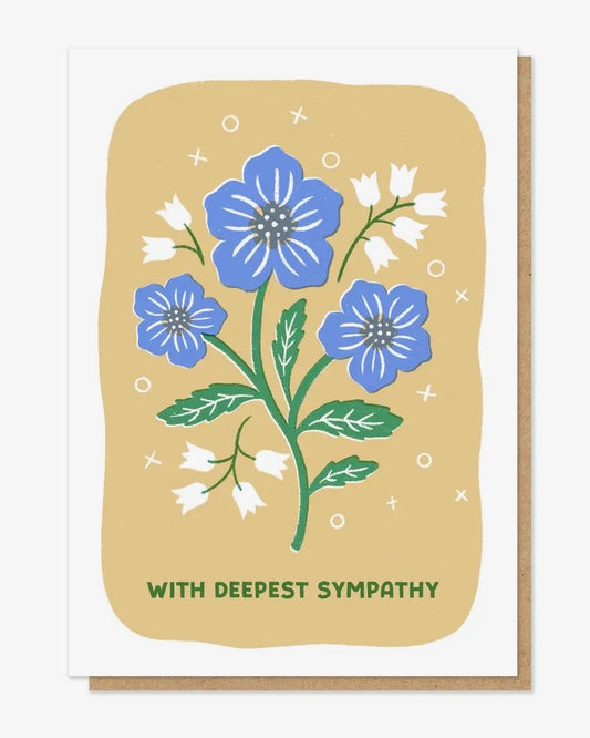 Sympathy card with blue flowers and text on a beige background