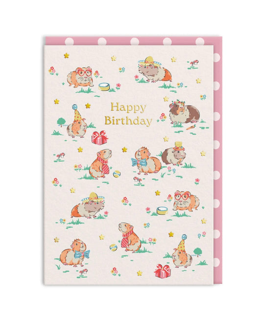 Birthday card with illustrations of Guinea pigs in party hats and 'Happy Birthday' text on a white background, with pink dotted envelope.