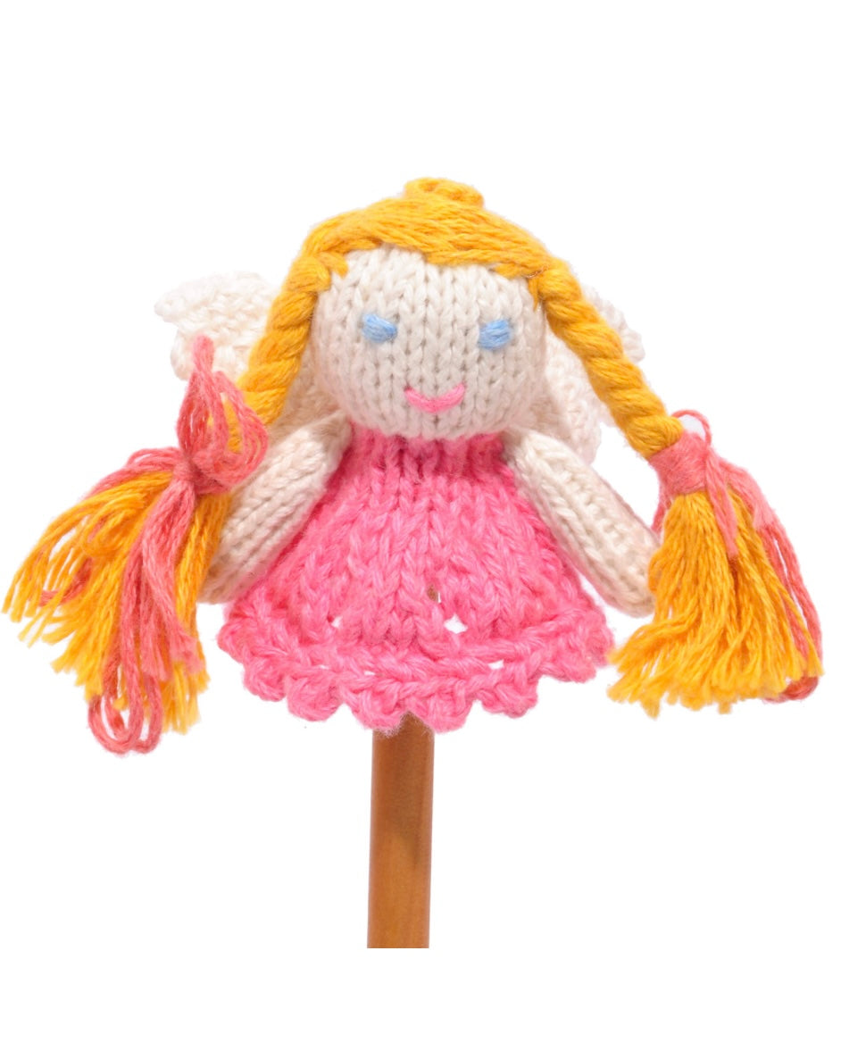 Knitted angel finger puppet with blonde hair and a pink dress, on a white background