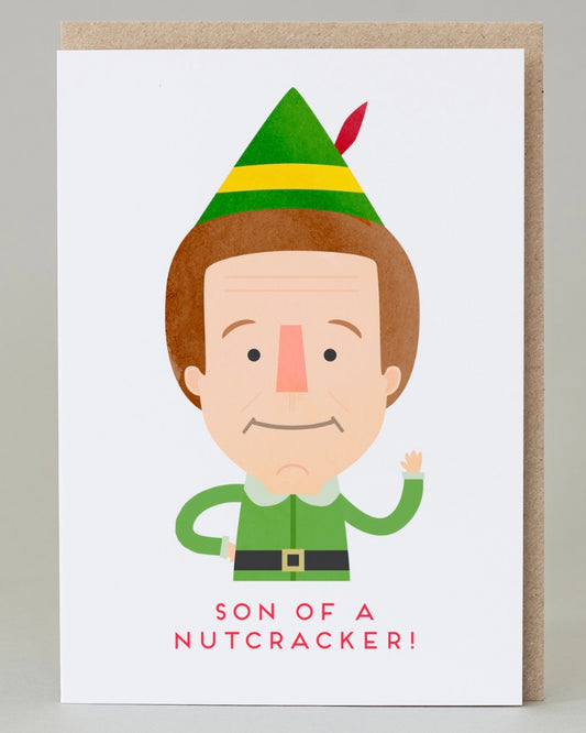Card with cartoon character wearing an elf costume and text 'Son of a Nutcracker!' on a white background.