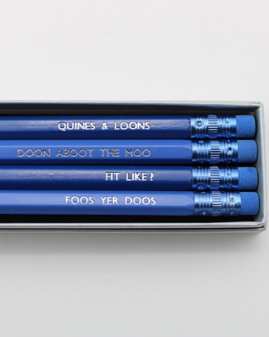 Set of blue pencils with Doric words text in a box, words'Quines & Loons' visible on one pencil