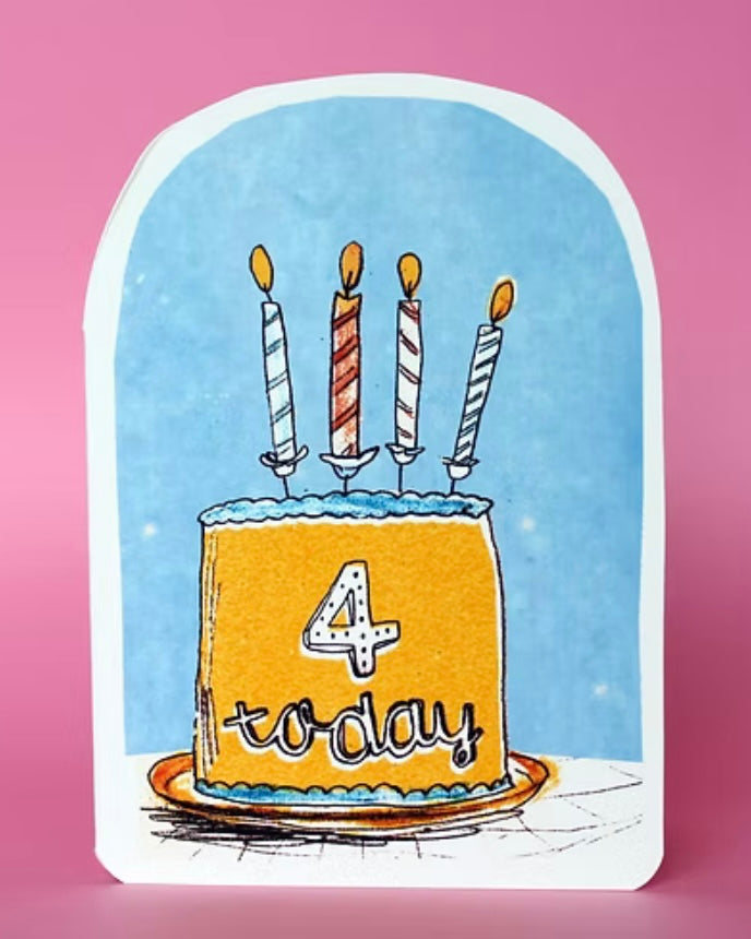 Birthday card with a cake and 4 candles on a blue background, reading ‘4 Today’