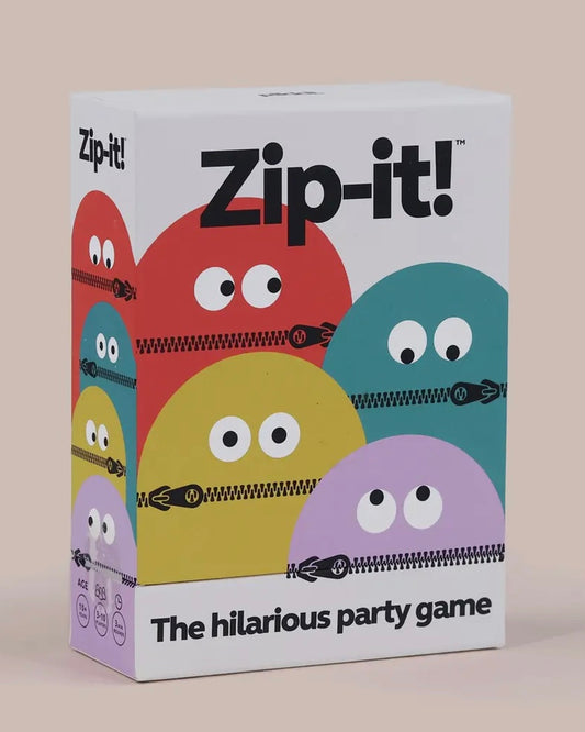 Box of 'Zip-it!' game with colourful faces and zippers on a beige background