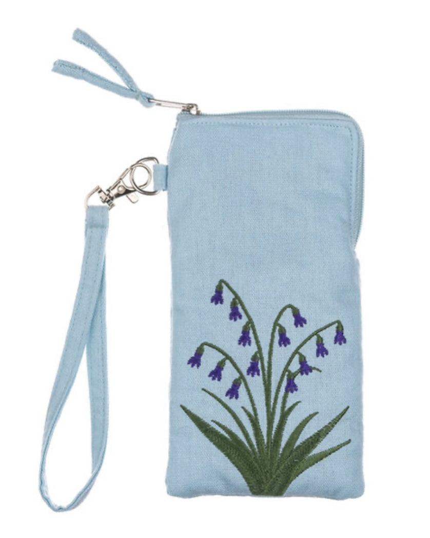 Light blue glasses pouch with embroidered design of bluebell flowers and a strap on a white background