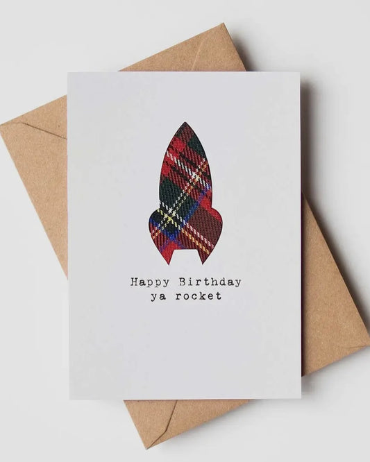 White card with cloth tartan rocket shape and the words Happy Birthday Ya Rocket, on a brown envelope