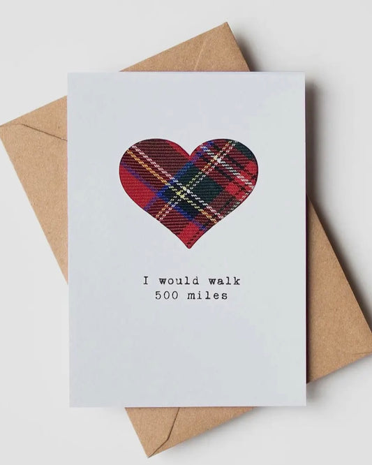 White card with a real cloth tartan insert, with the words I would walk 500 miles, on a brown envelope