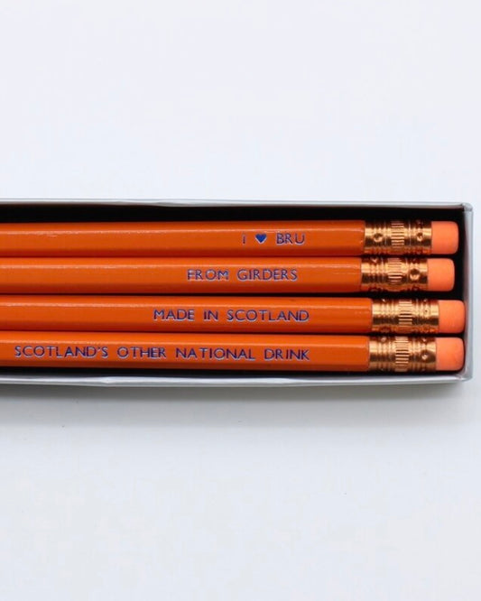 Box of pencils with text relating to the drink Irn Bru  on a white background