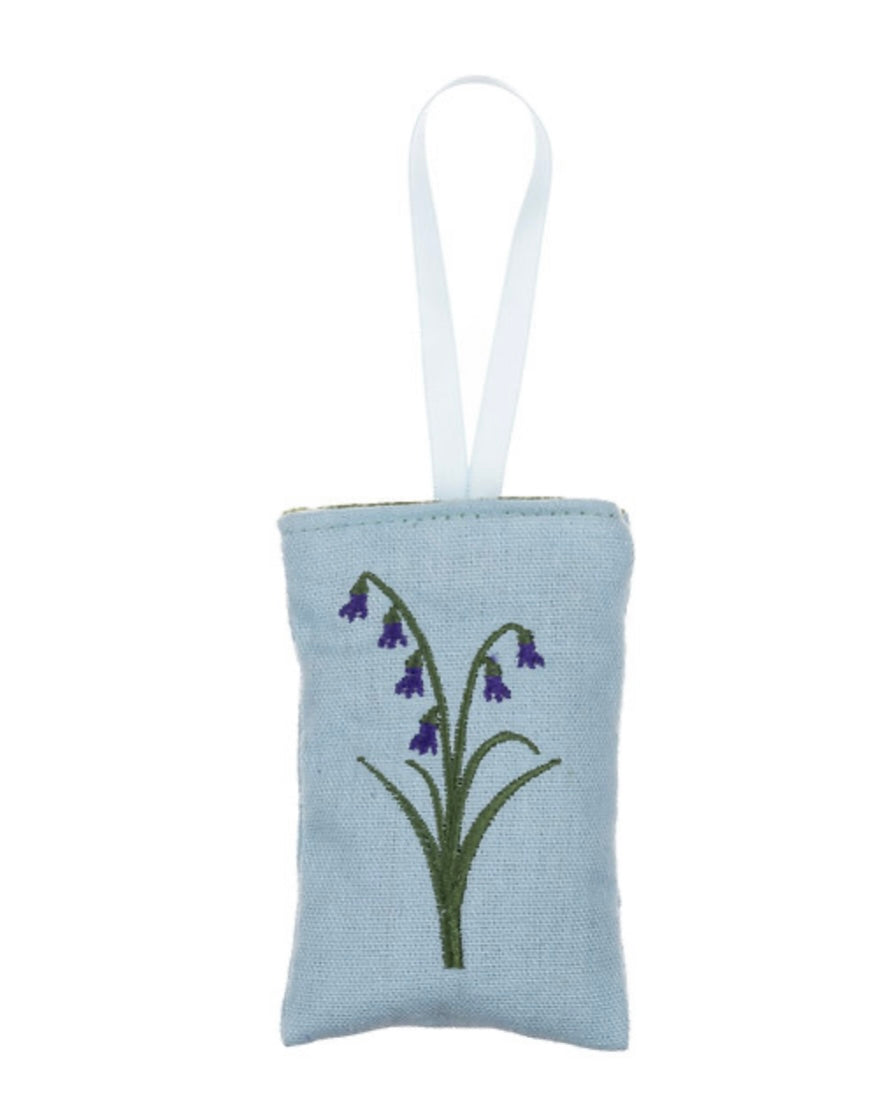 Light blue lavender pouch with embroidered design of flowers on a white background