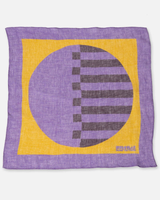 Purple and yellow patterned fabric with a circular design on a white background