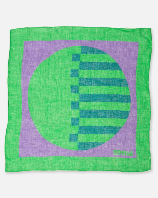 Green and purple fabric napkin with a circular design