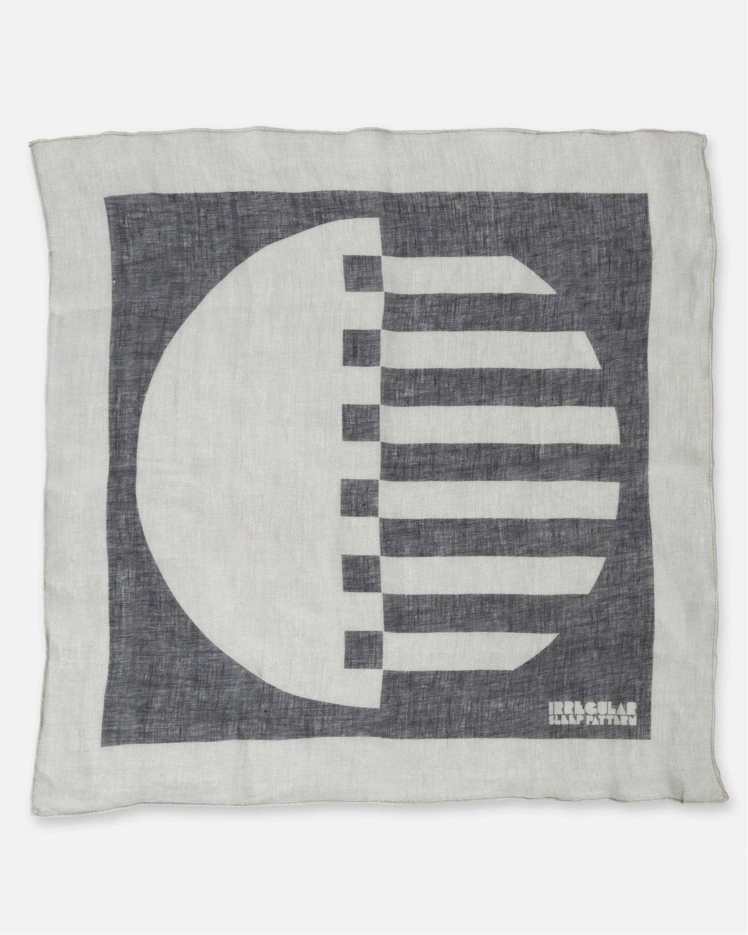 Decorative linen napkin / scarf with black & white geometric design on a white background