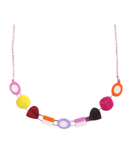 Necklace featuring colourful acrylic ‘dolly mixture’ sweets on a curved acrylic setting, with chain attached.