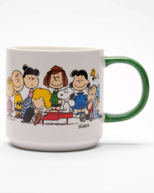 Mug with Peanuts cartoon characters and Snoopy on a white background