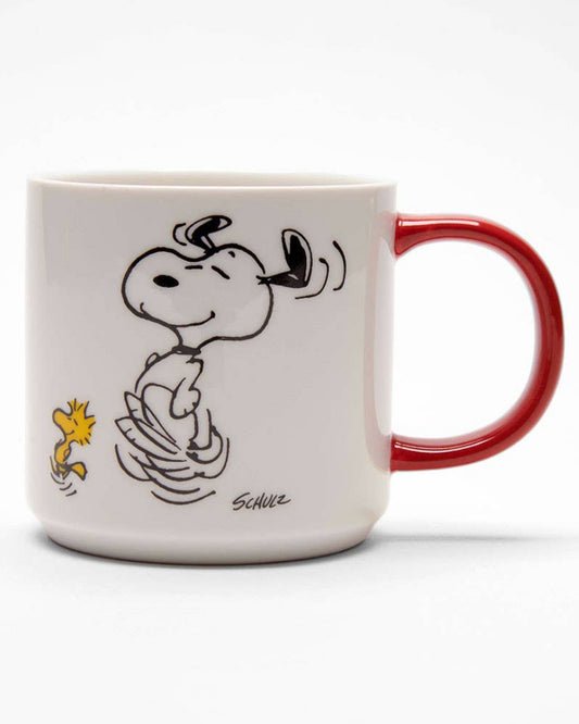 Mug with Snoopy cartoon character design on a white background