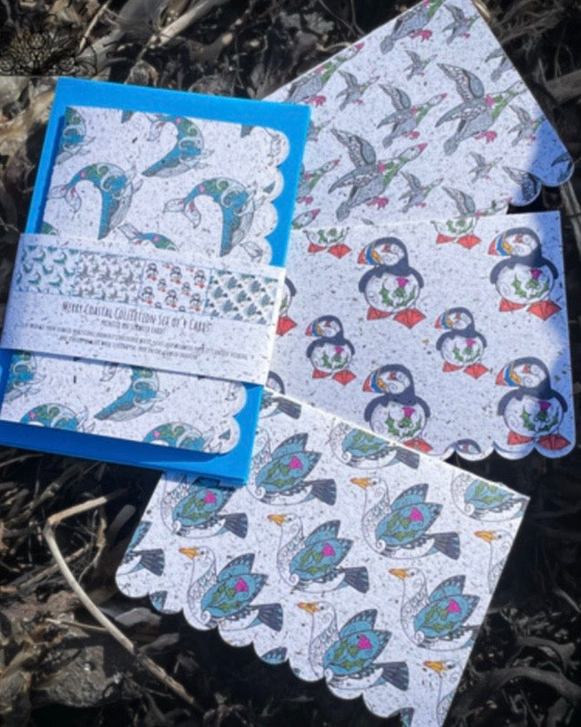 Set of note cards with puffin, seagull, whale & goose designs, on a natural background