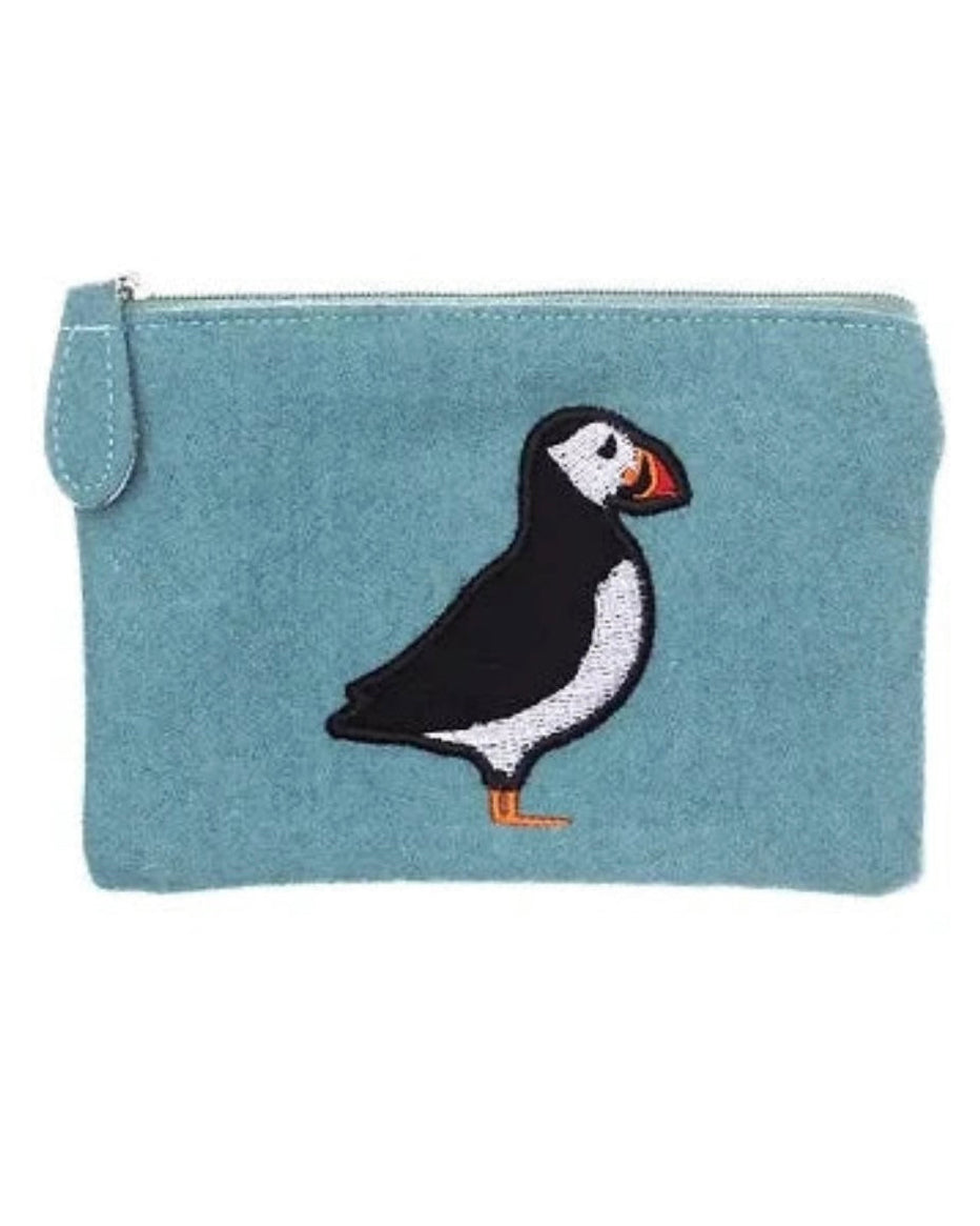 Light blue felt purse with a puffin design on a white background