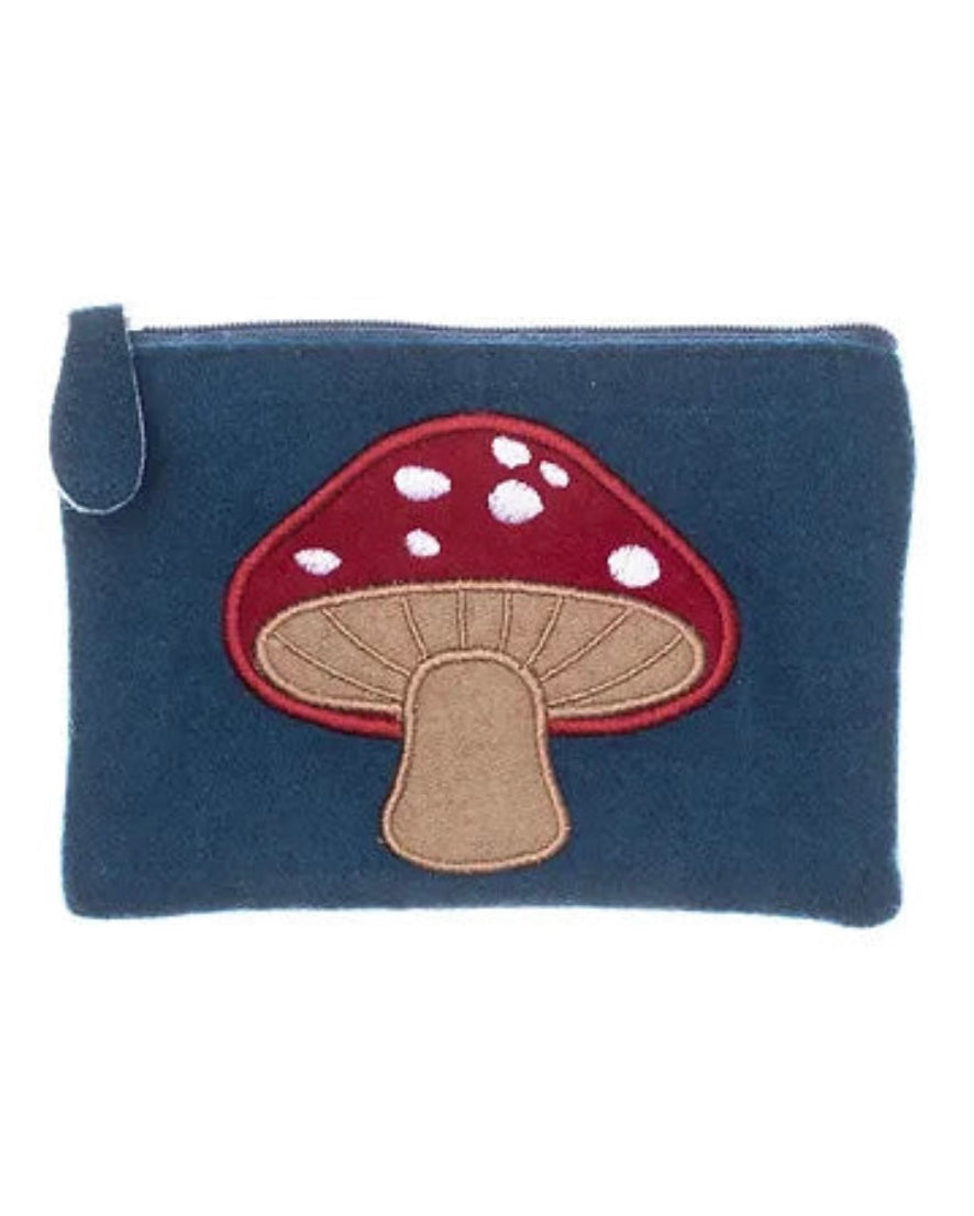 Blue felt purse with a red and brown mushroom design on a white background