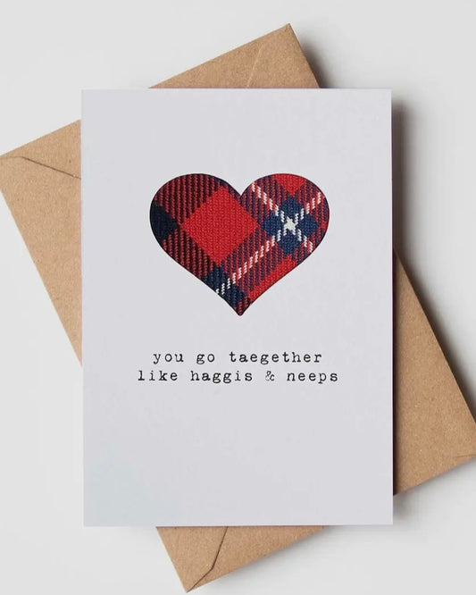 White card with cloth tartan insert and the words You go taegether like haggis and neeps, on a brown envelope